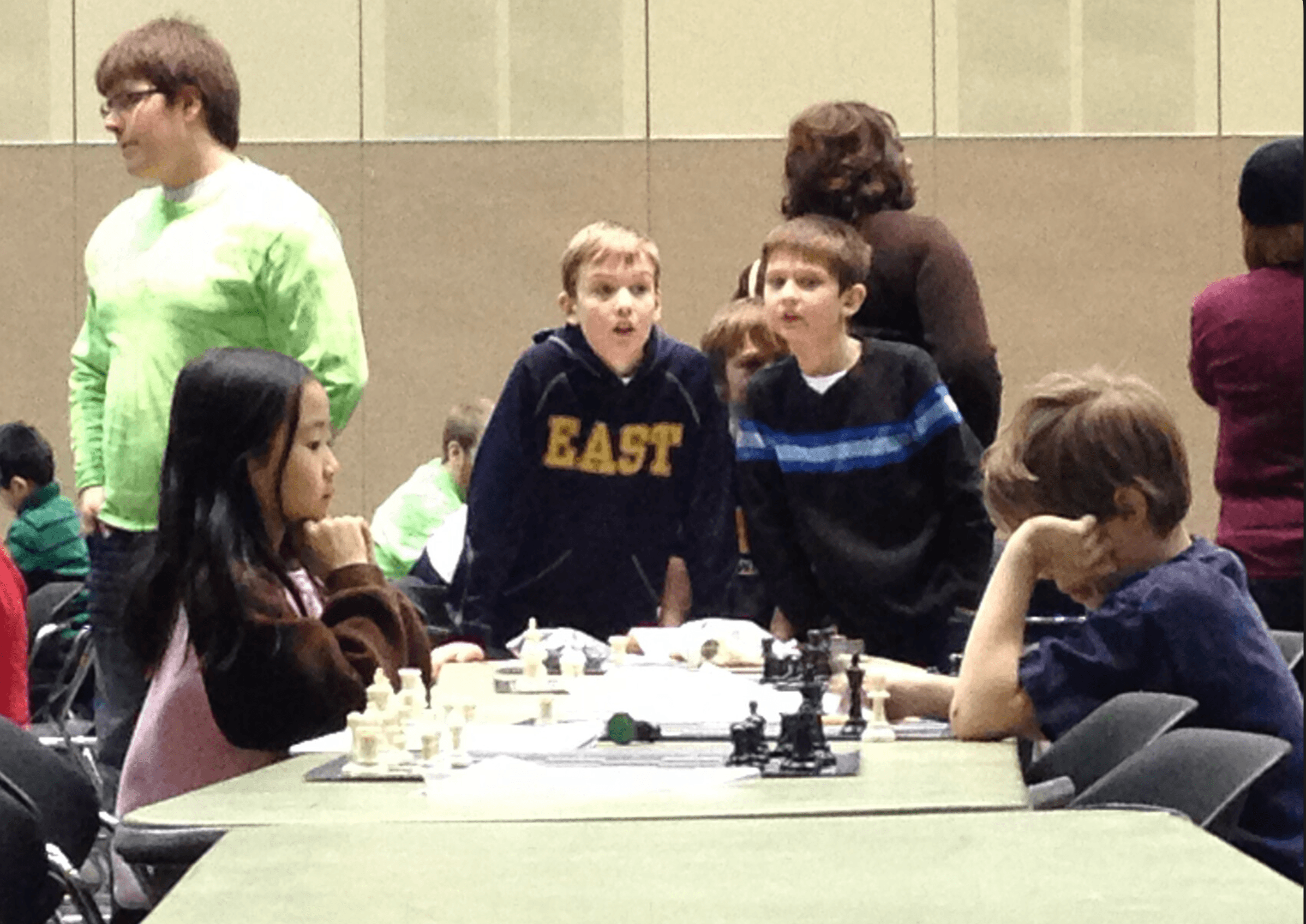 Jia as a child at a chess tournament